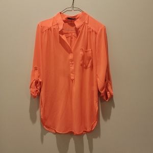 Neon pink blouse